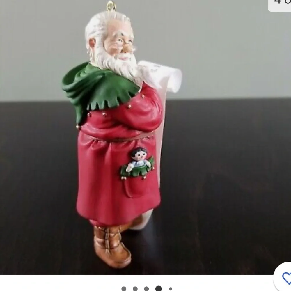 HALLMARK ORNAMENT CHECKING THE LIST 2002